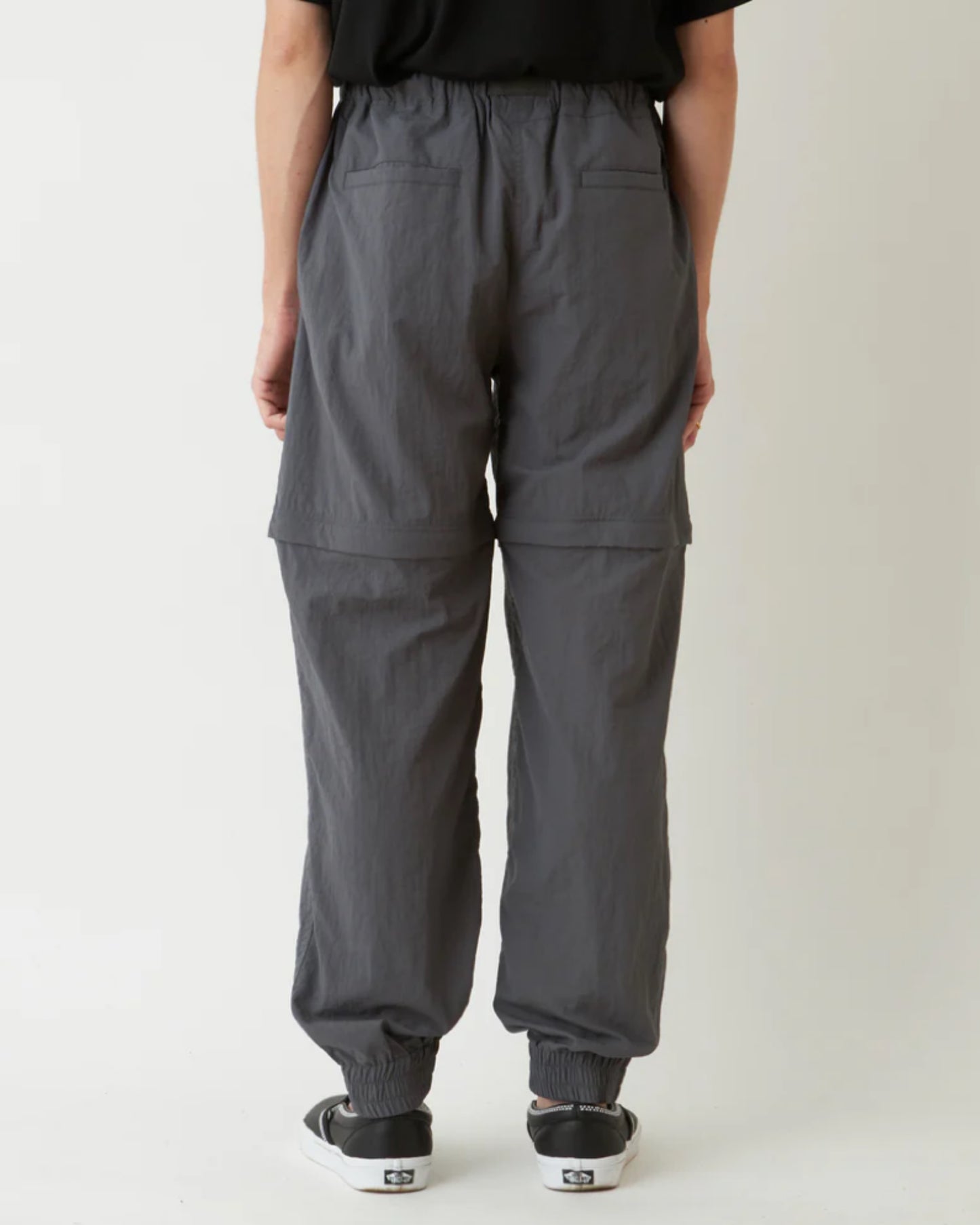 WM x GRAMICCI ZIP OFF JOGGER PANTS (CHARCOAL)